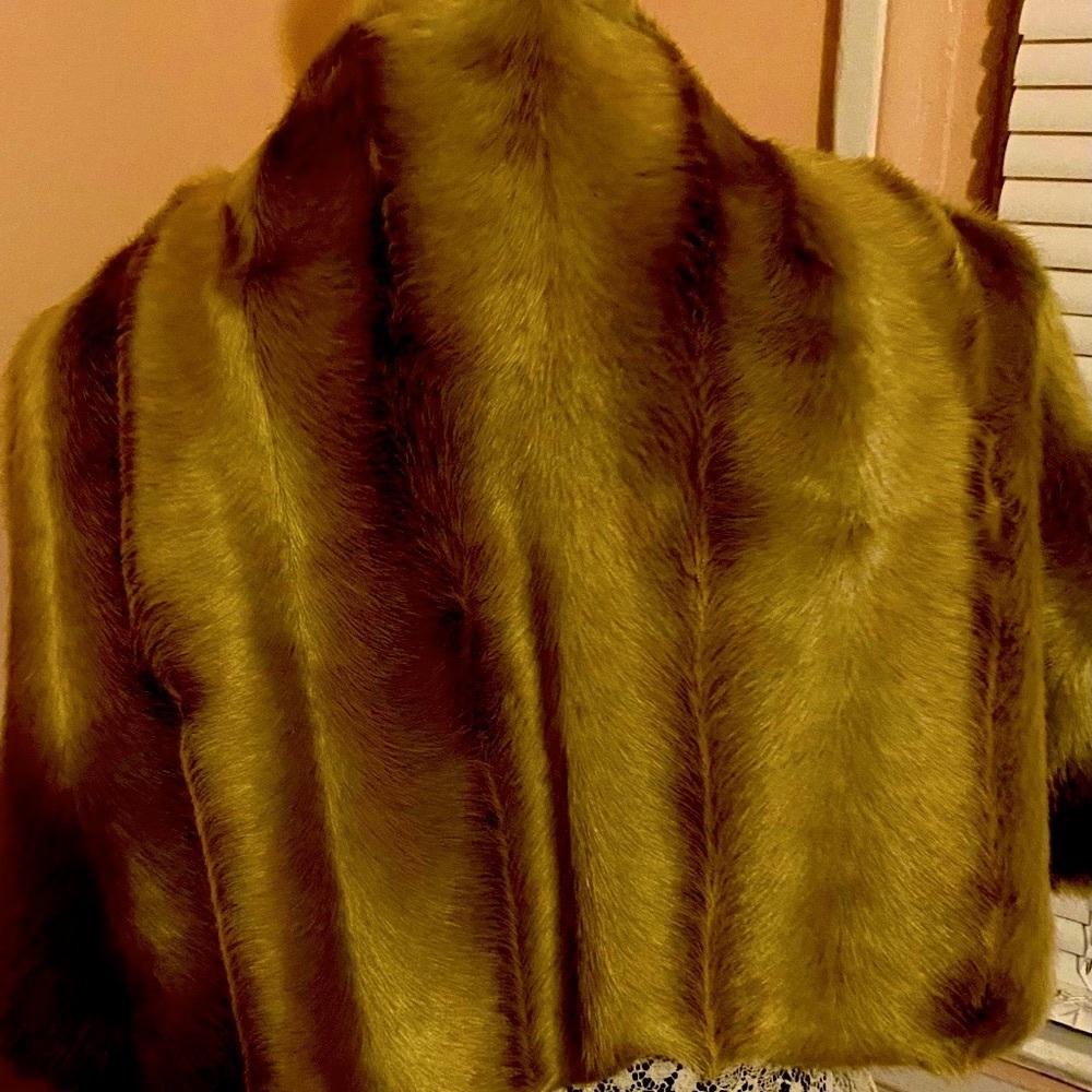 Evening wear faux fur for after five wear. To wear at a wedding or formal.